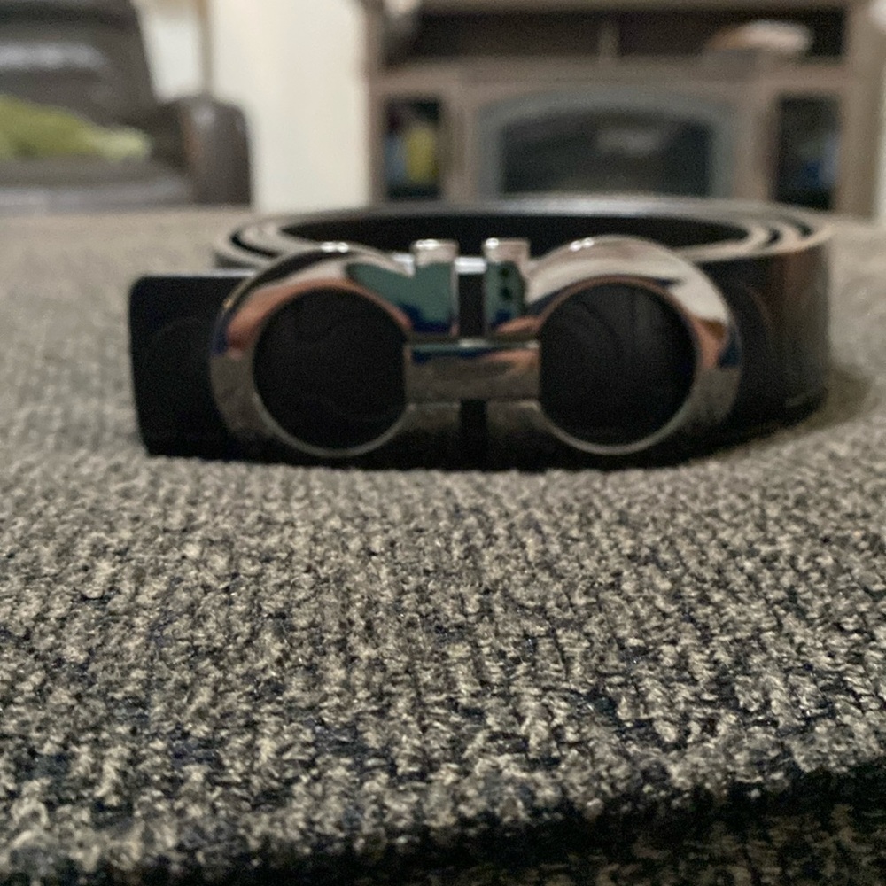 Grey Ferragamo buckle with Black leather belt.